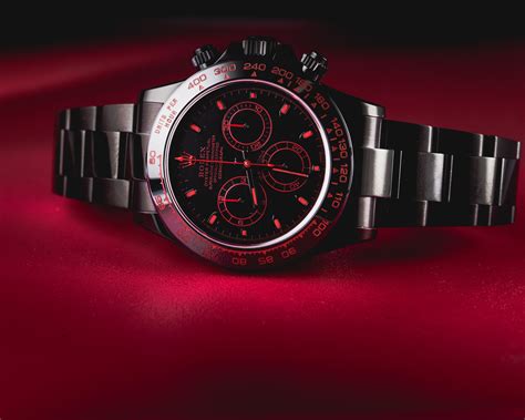 rolex daytona black red